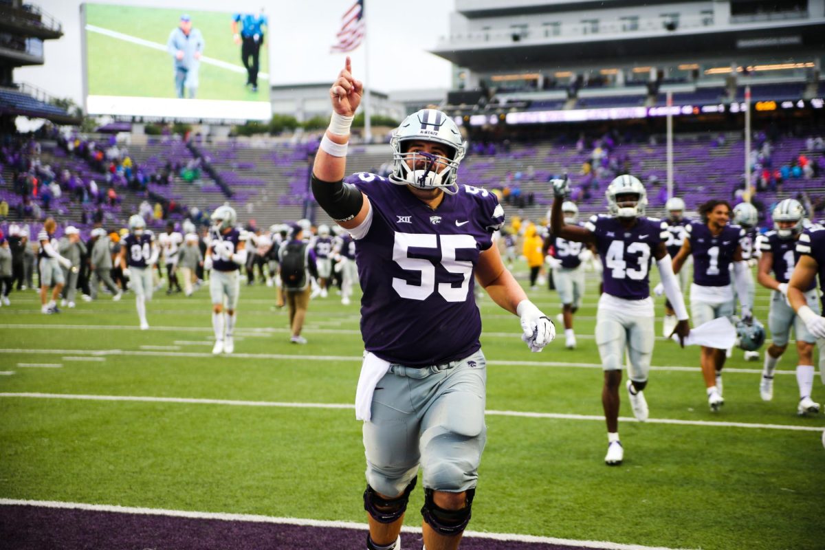 Running to the tunnel, then senior offensive lineman Hayden Gillum celebrates after the game. Kansas State beat the University of Missouri 40-12 on Sept. 10, 2022. Photo by Macey Franko.