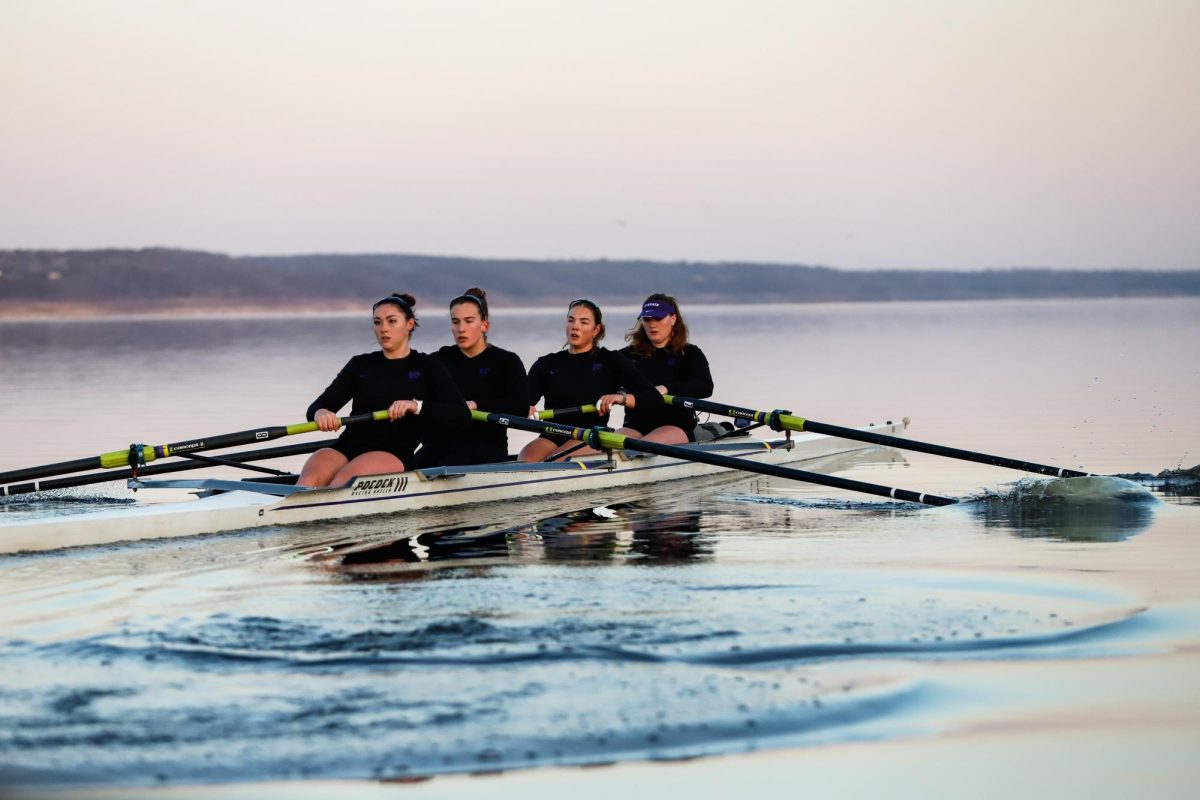 The K-State rowing team prepares for competition by practicing on Tuttle Creek. Photo by Madison Riebel.